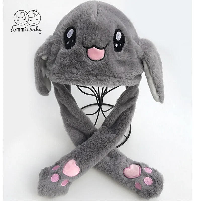 Шапка заяц с двигающимися ушами светящиеся. Двигающаяся шапка. Двигающаяся шапка. Розовая шапка с ушками. Шапка с ушками двигающимися.