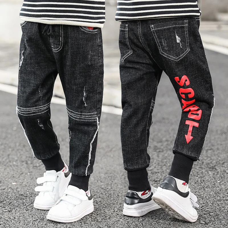  Baby clothes spring and autumn 2020 personality boys pants new trousers female white line jeans 3-1