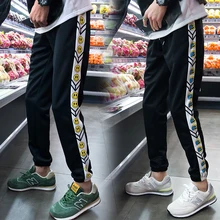 Men's Trousers 2019 Four Seasons Apply Casual Beam Foot Smiley Print Harlan Pin Pants Youth Sports Pants Casual Men's Clothing