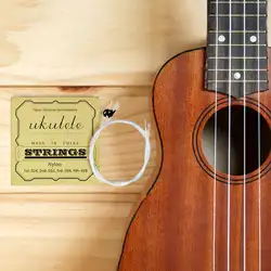 Новый дизайн 4 шт./компл. Универсальный нейлоновые гистограммы Гавайская гитара маленькая четырехструнная с розничной посылка