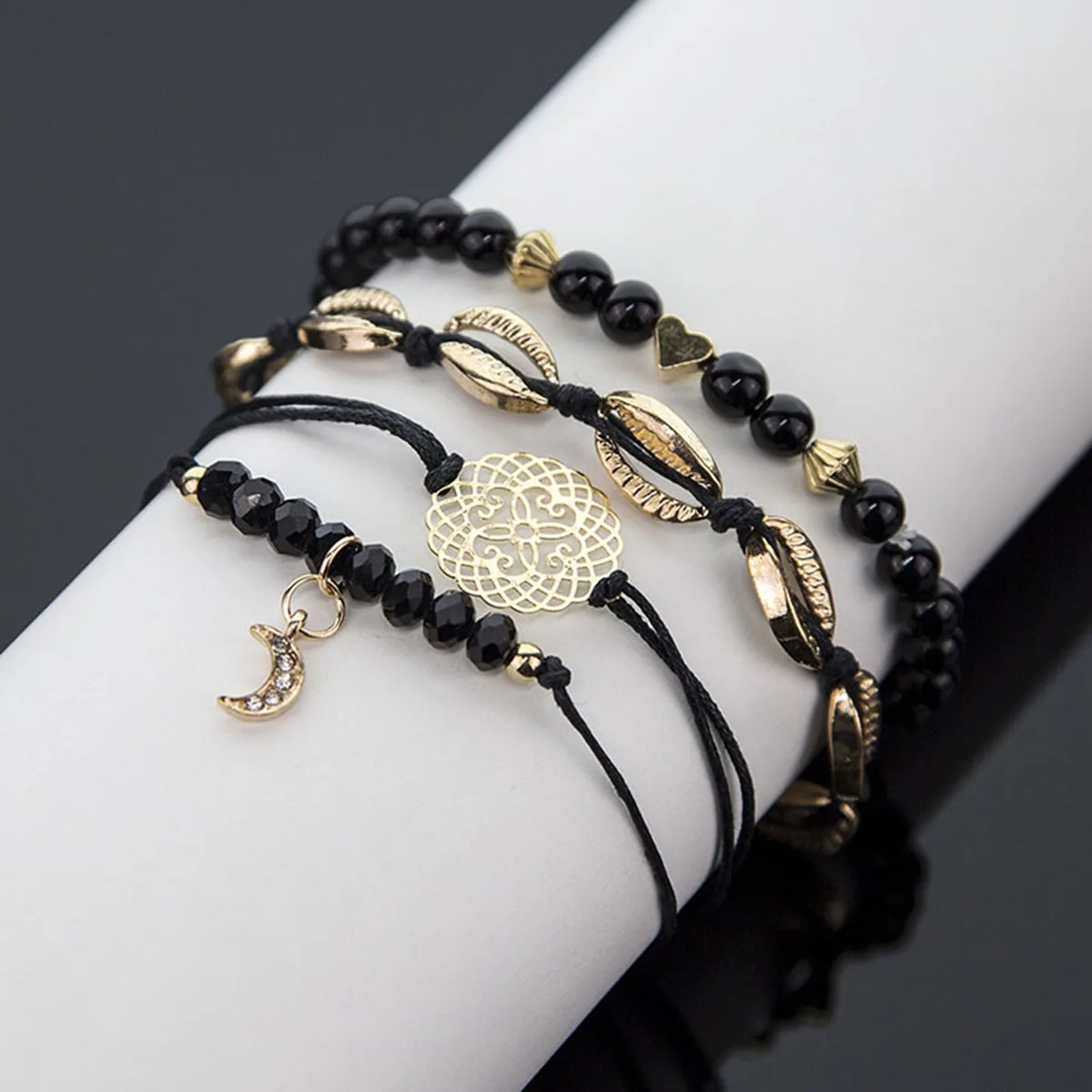 

Bohemian Vintage Shell Hollow Flower Beaded Bracelet Set for Women Black Woven Rope Heart Moon Bracelets Set Boho Jewelry