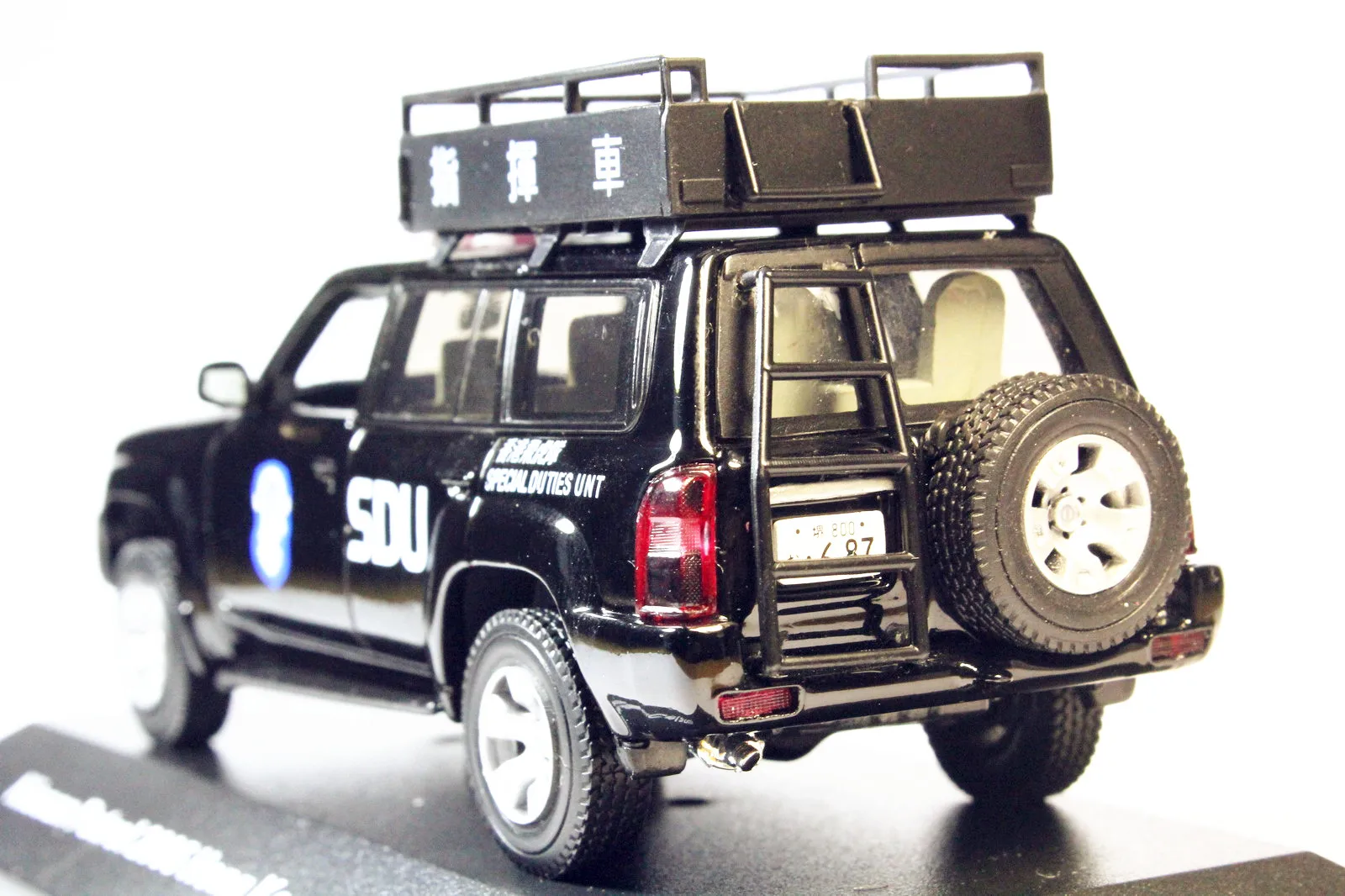 J-коллекция 1/43 Nissan Patrol 2005(Y61) Hong Kong Police(SDU) командная машина