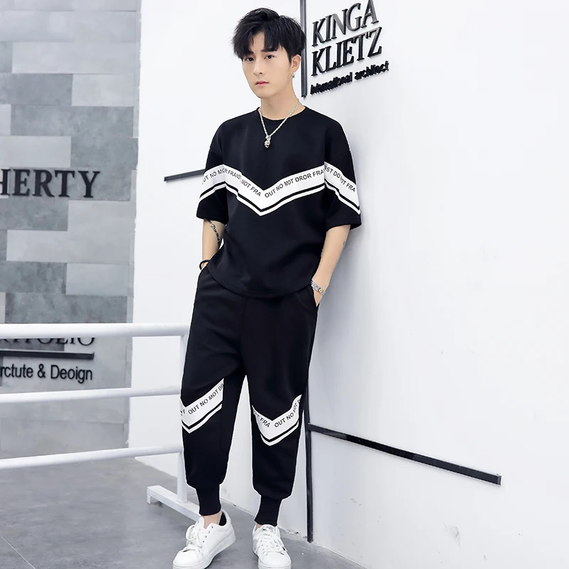 

2019 summer new Thin short-sleeved men's youth casual sports Korean version loose seven-point Black sleeve shirt Free shipping