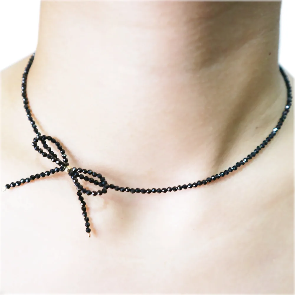 

Lii Ji Black Spinel Bowknot Necklace Natural Stone 925 Sterling Silver 18K Gold Plated Choker Sparkling Female Necklace
