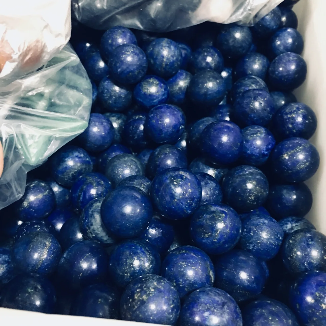 

Natural lapis lazuli crystal ball Feng Shui ornaments Round beads small ball energy spar wholesale