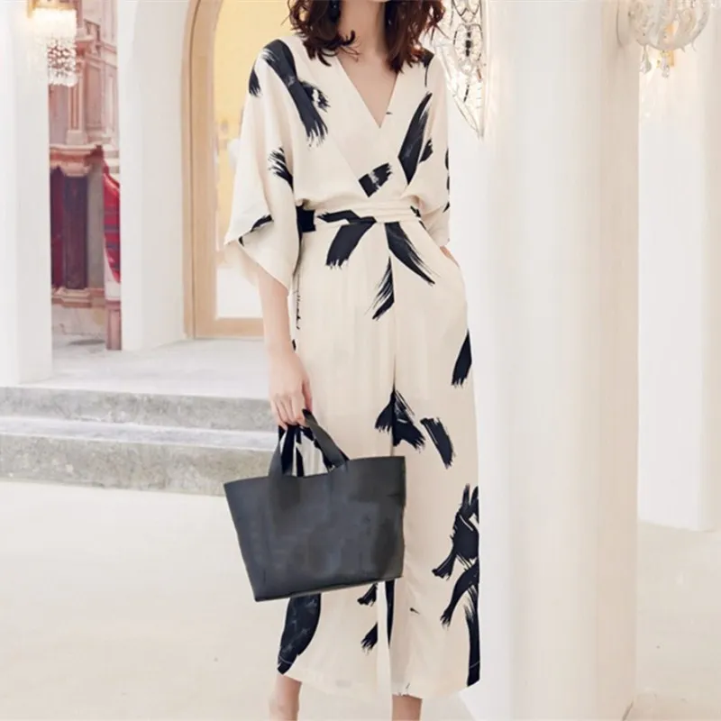 New Arrival Summer Women V-Neck Slim Jumpsuits Female Floral Print Three Quarter Sleeve Wide-Leg Rompers New Arrival Summer Women V-Neck Slim Jumpsuits Female Floral Print Three Quarter Sleeve Wide-Leg Rompers