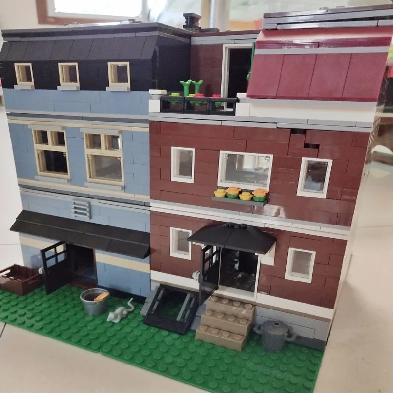 

Lepin 15009 Originality Streetscape Series 2128pcs Nostalgia Pets Shop Alpinia Oxyphylla Insert Assembling Building Blocks Toys