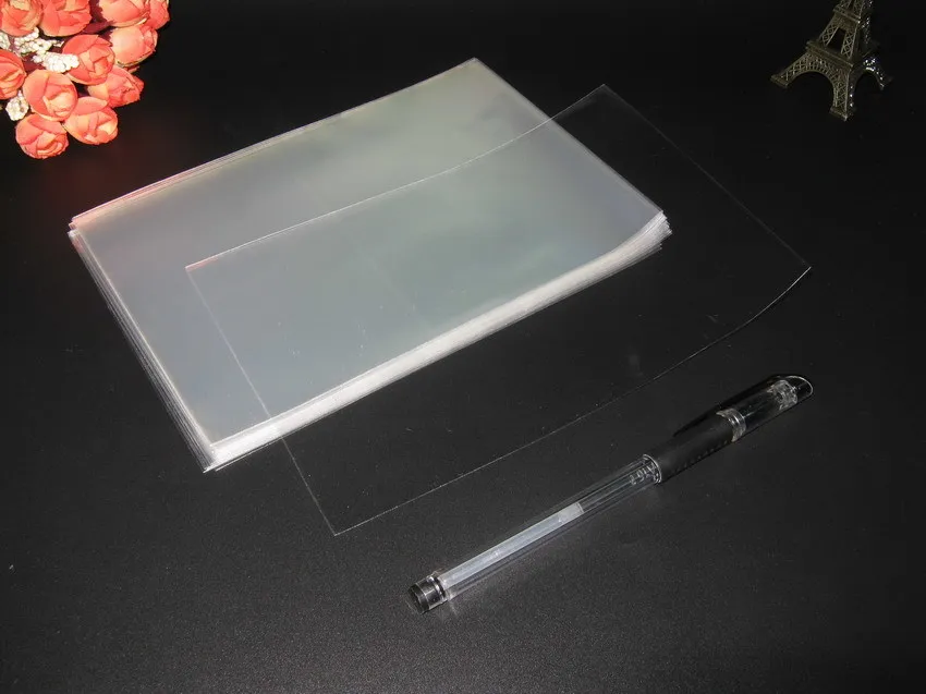 

100pcs open top punches Clear Cellophane Bags 13x18cm Transparent Opp Cosmetic Plastic Packing Bag Gift Candy Tools Flat Pocket