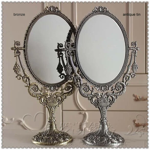 

vintage oval 360 rotating double face desktop table makeup mirror cosmetic mirror embossed metal mirror frame true image 331A
