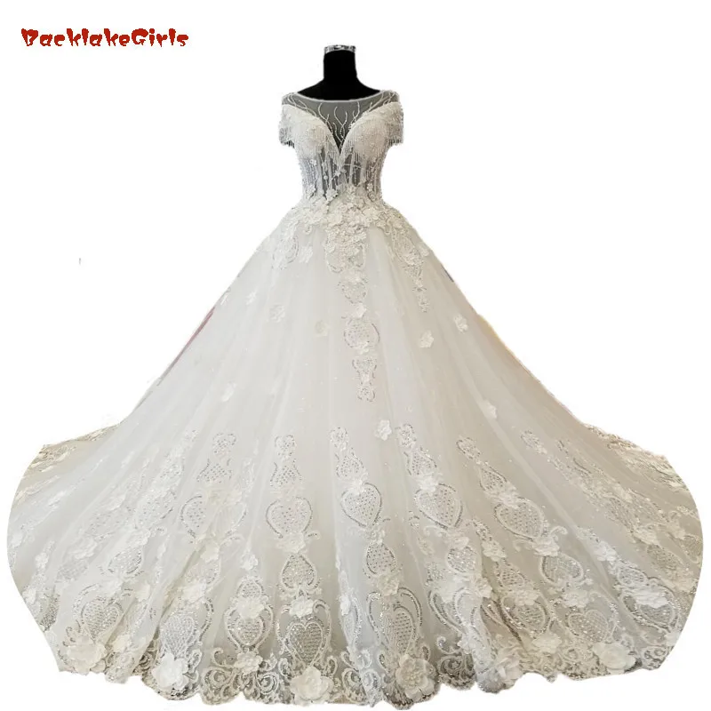 

2018 Luxury Ivory Tulle Vintage Wedding Dresses Sleeveless Scoop Trouwjurk Cathedral Train Ball Gown Illusion Vestido Noiva