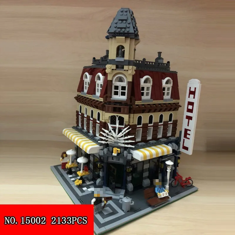 

Lepin 2133pcs Streetscape Series Corner Coffee Shop Spelling Insert Building Block Alpinia Oxyphylla Toys Building Blocks 15002