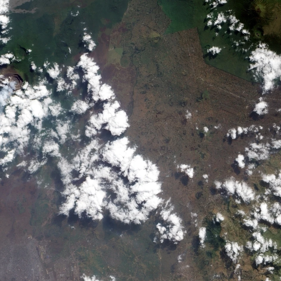 A small plume rises from Nyiragongo Volcano in the Democratic Republic of Congo Poster Print (28 x 27) | Дом и сад