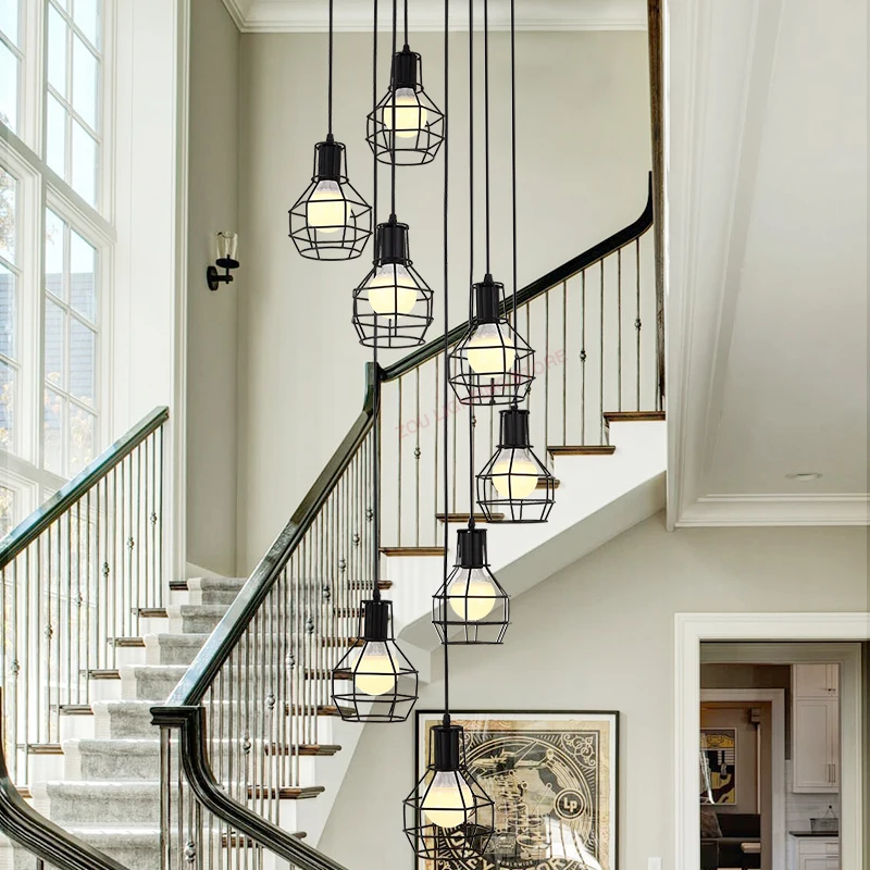 

Modern metal double staircase led chandelier. Lobby hotel living room lighting