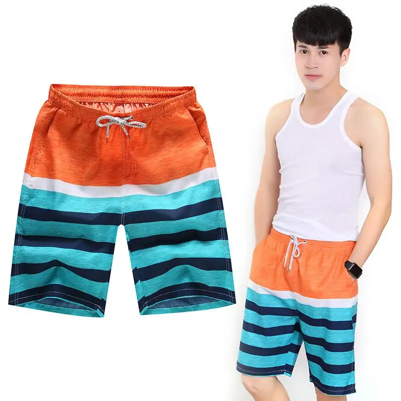 الرجال بناطيل الشواطئ عارضة فضفاض الأزهار السراويل التجفيف السريع تصفح بناطيل الشواطئ 4XL ملابس الرجال جذوع التمويه