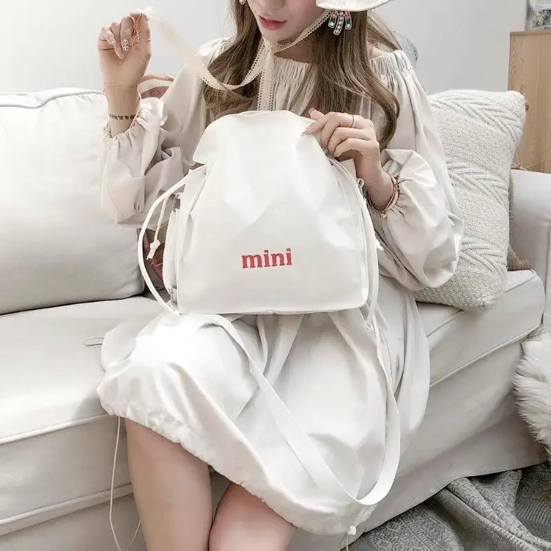 

Fashion Women Drawstring Shoulder Bags Candy Colors String Handbag Canvas Letter Print Crossbody Bag Street Shopping Bag New