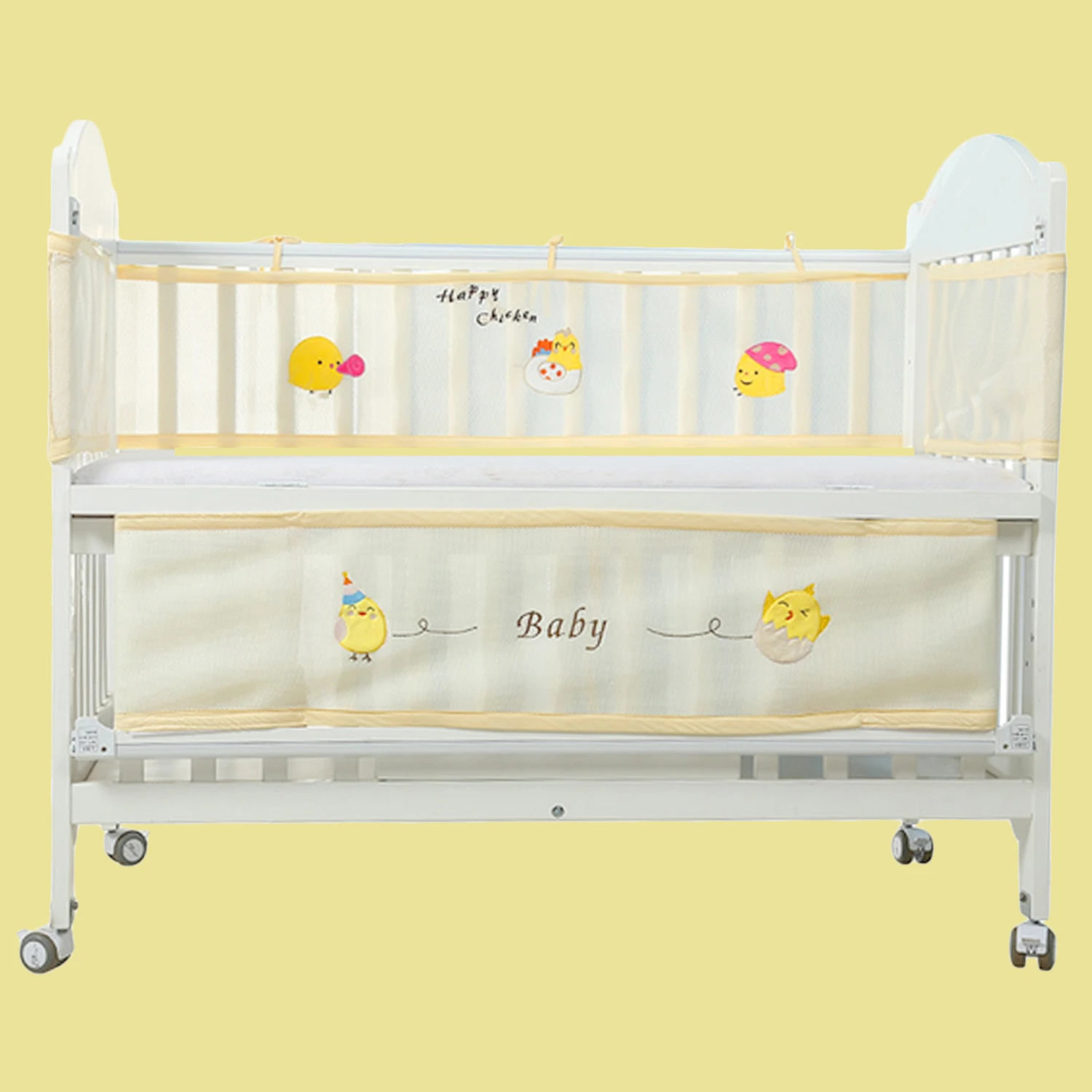 yellow crib bumper