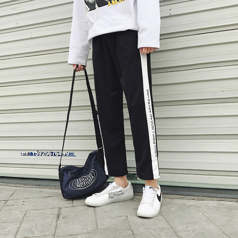 Men's trousers 2019 spring and summer nine pants loose stitching straight printing travel leisure trend youth men's clothing