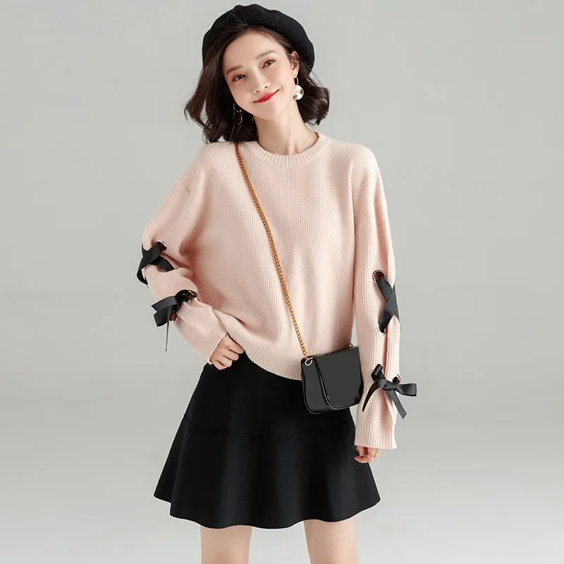 2018 autumn and winter new solid color knitted shirt long-sleeved side cross strap simple sweater loose bottoming sweater sj1114