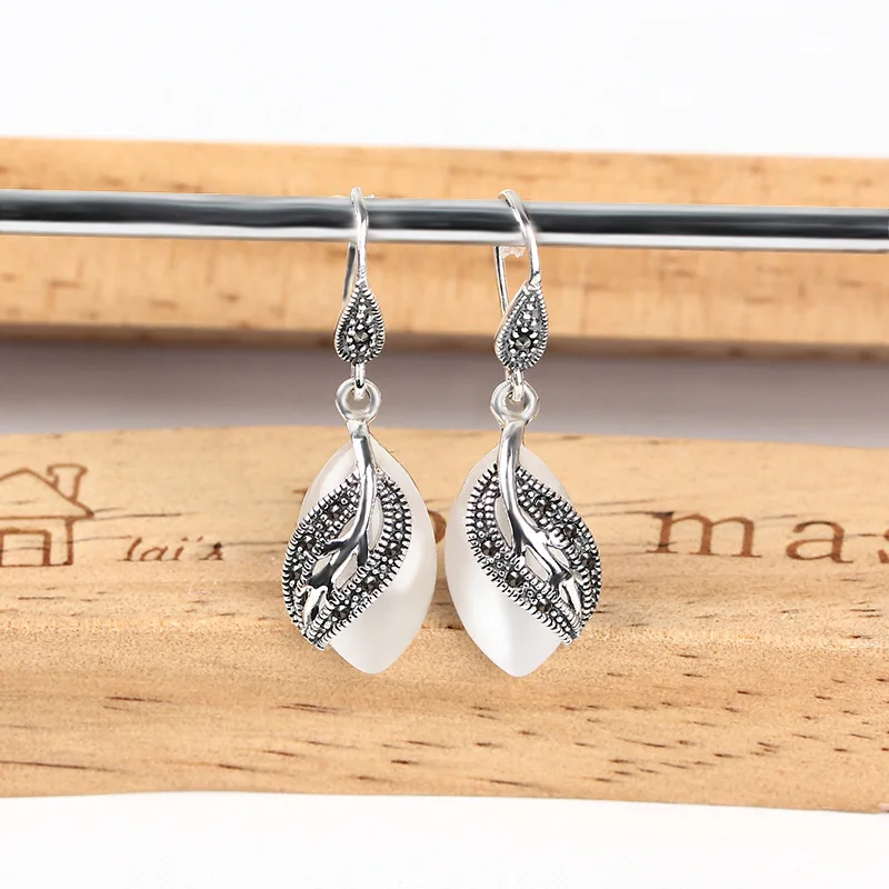 

Jiashun Tai 925 Silver Ears Female Korean Edition Fashion Retro White Cat Eye Ears Water Drop Ears