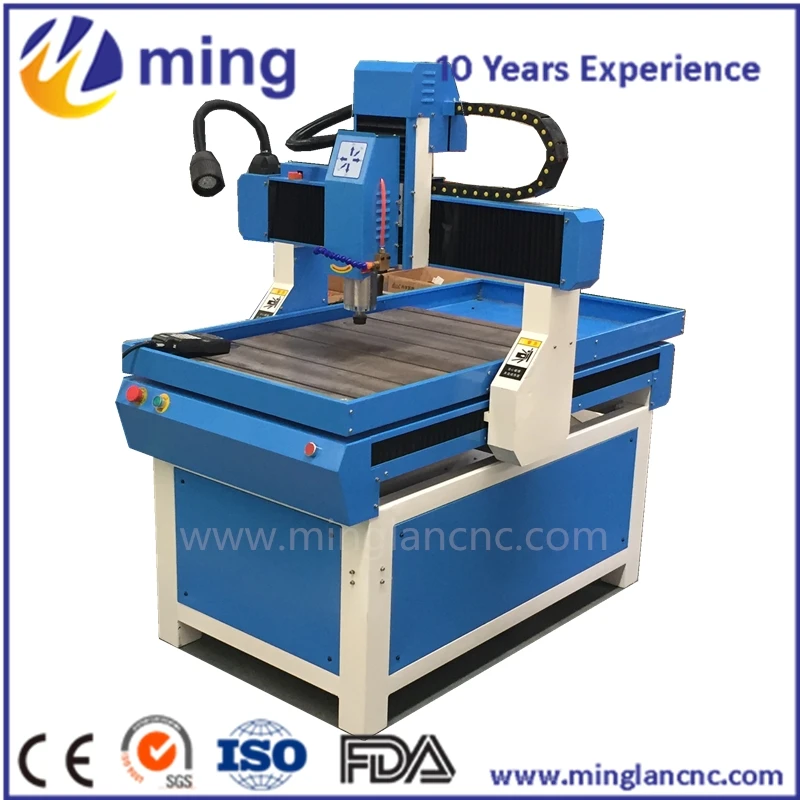 

advertisement mini cnc router Minglan CNC hot sale 6090 machine