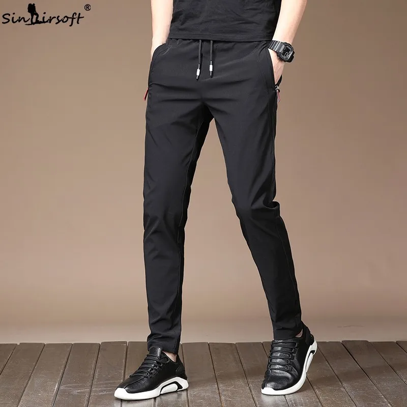 

Men's Summer Casual Sport Pants Men Elastic Nine Pants Small Feet Joggers Pants Drawstring Beam Pants Versatile Trousers Homme