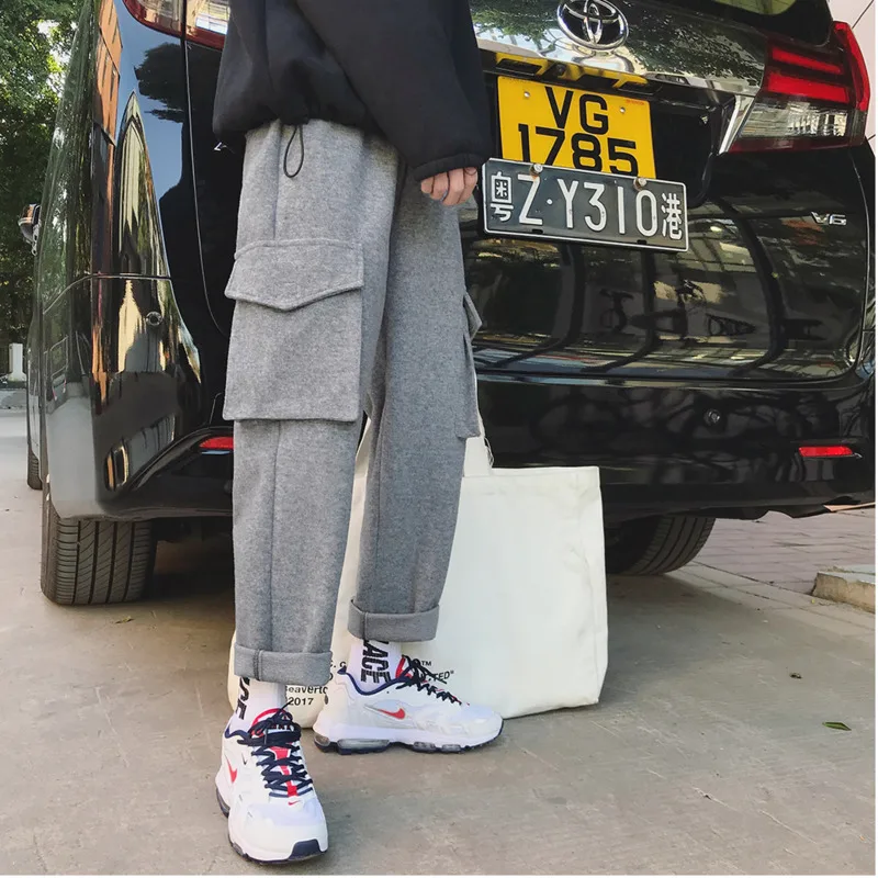 

2018 Winter Thickening Tooling Material Solid Color Loose Simple Straight Pants Large Pocket Black Gray trousers men streetwear