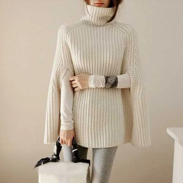 Женский вязаный свитер с высоким воротом черный свободный