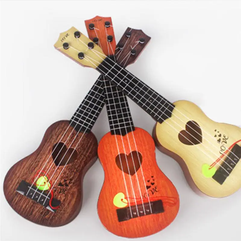 

1pc Children Small Size Musical Instruments Imitated Ukulele Mini Guitar Playing Toy With Four Strings