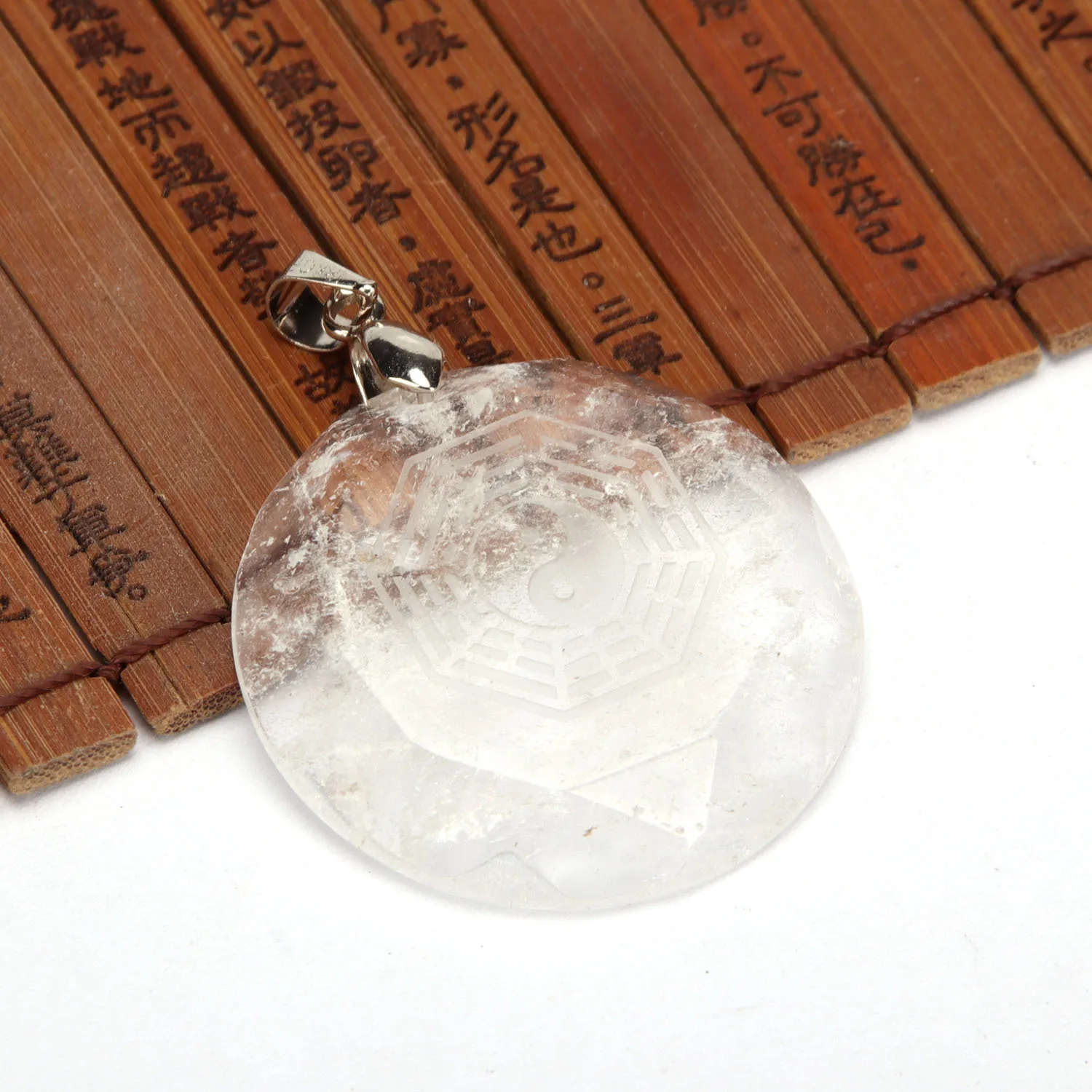 

Gossip Pattern Natural White Crystal Pendant Round Cut Face Carving Religion Taoism Necklace For Women Man