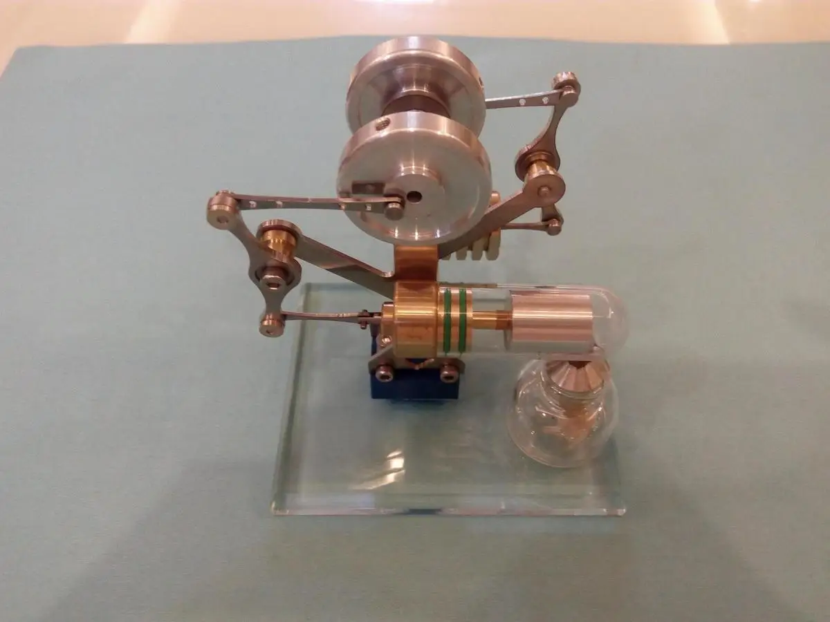 

Sterling Engine Metal Mini Balance Type External Combustion Steam Engine Movable Model Toy Collection Gift Free Shipping