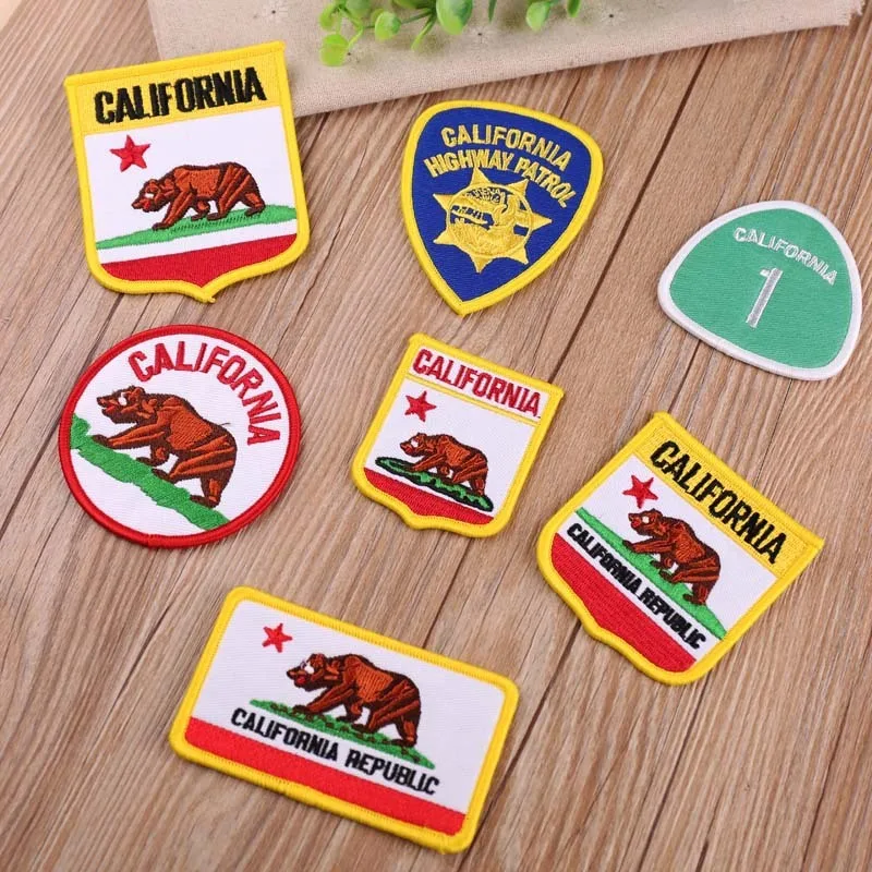 

PGY 1PCS Creative Cheap Embroidery Patch Iron On Clothes lovely CALIFORNIA Brown bear for Clothes DIY Decorative Jacket Stickers