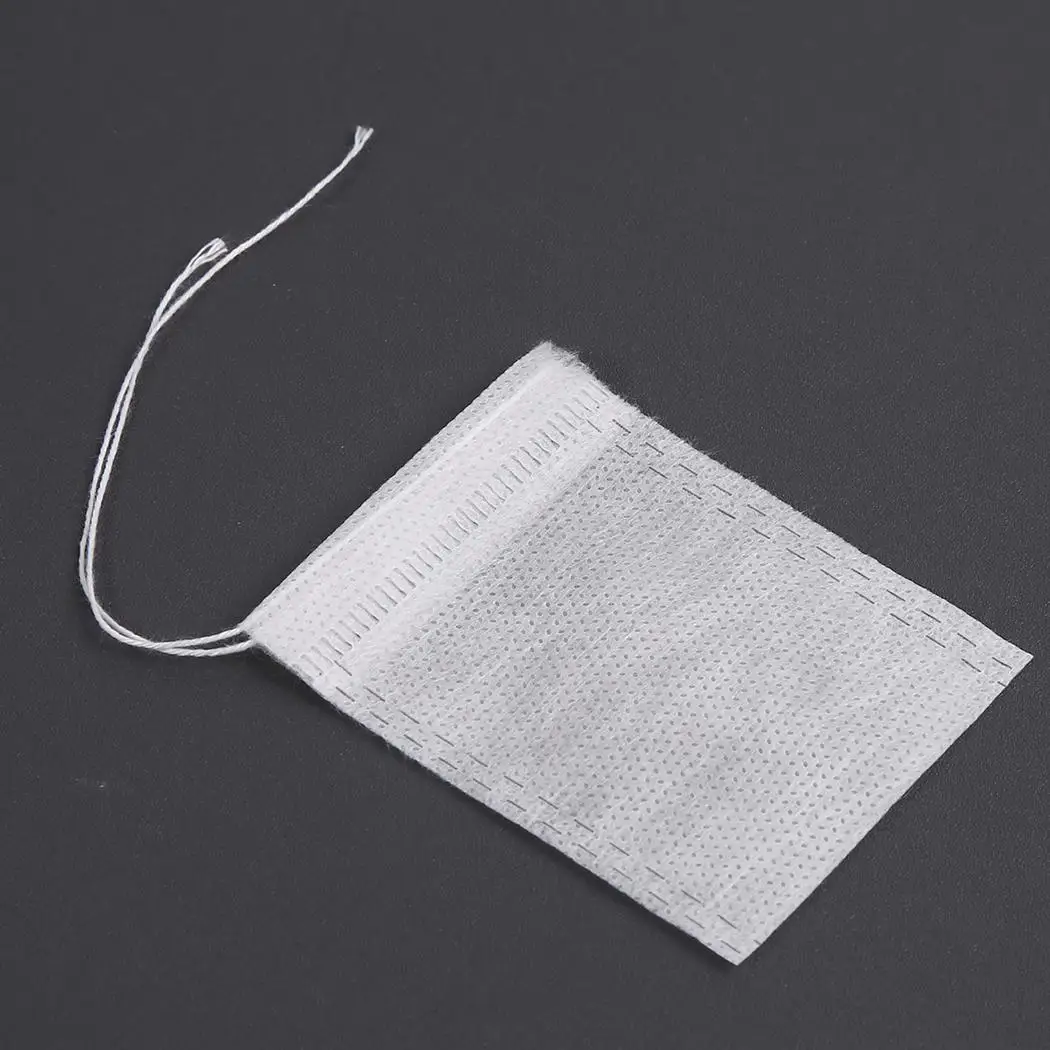 

100Pcs Soup Spice Herb Filter Bags Teabags Empty Scented Tea Bags String Heal Seal Filter Paper for Herb Loose Tea