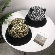 Отправить Leopard шапки с принтом мэм осень и зима милые кошачьи ушки Рыбацкая шляпа Корейская Студенческая Мода джокер короткими навес Кепки