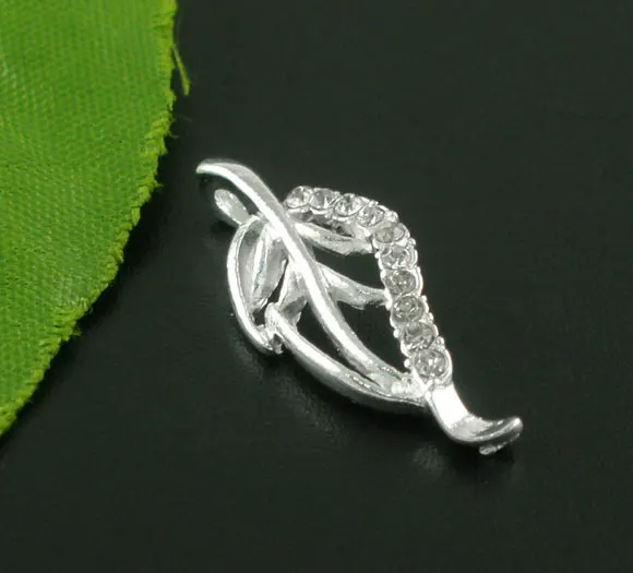 

DoreenBeads 10 Silver Plated Rhinestone Leaf Charm Pendants 25x10mm (B07199) yiwu