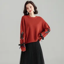 2018 autumn and winter new solid color knitted shirt long-sleeved side cross strap simple sweater loose bottoming sweater sj1114