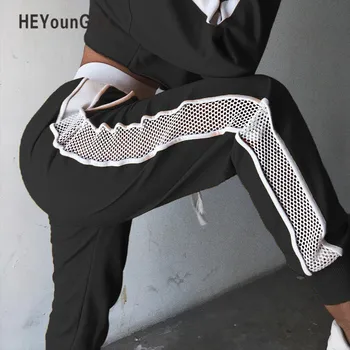 

Sexy Patchwork Mesh Women Sweatpants Black White Baggy Casual Pants Hollow Out Sexy Trousers Streetwear Holes Side Pants