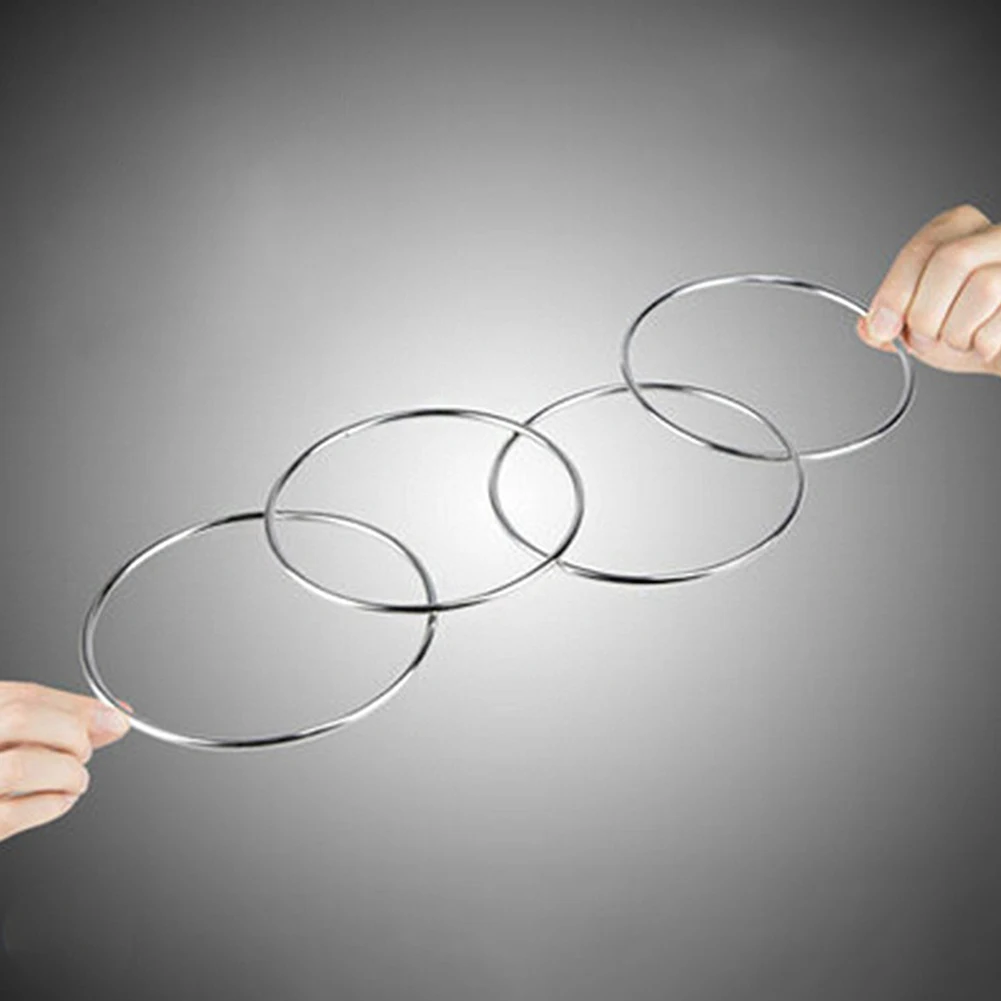 

4PCS/Set Linking Ring Magician Trick Show Performance Toys Fun Magic Prop Stage Metal Street