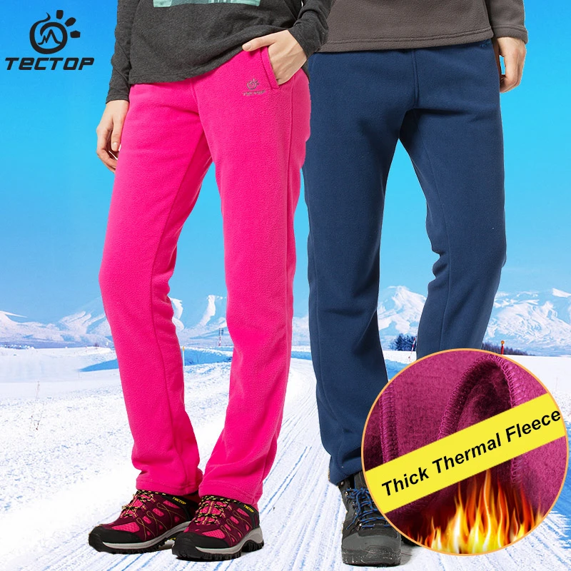 Plus tamaño de otoño de los hombres de invierno al aire libre de las mujeres al aire libre Camping senderismo pantalones gruesos de lana deportes Polar tela Polar a prueba de viento pantalones térmicos