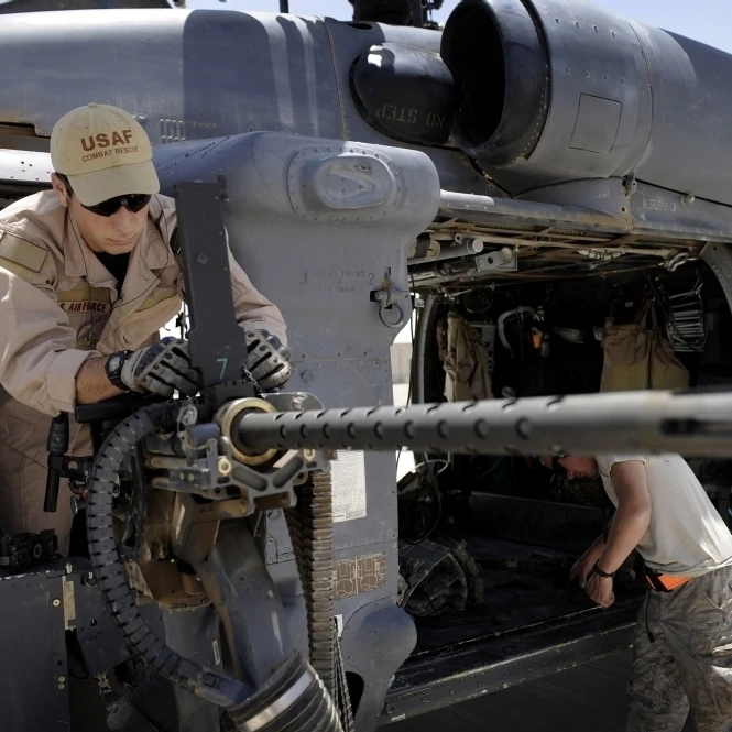 Airman Conducts A Preflight Inspection Of A 50 Caliber Machine Gun 