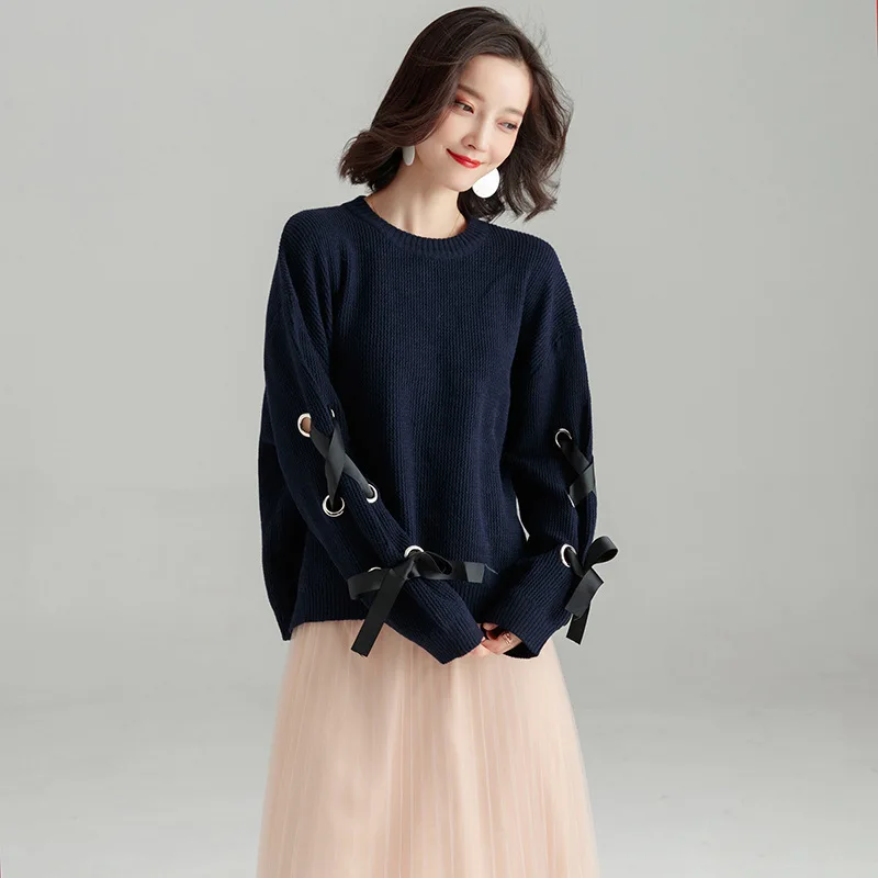 2018 autumn and winter new solid color knitted shirt long-sleeved side cross strap simple sweater loose bottoming sweater sj1114