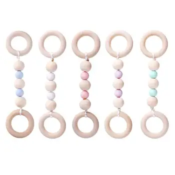 

Wood Ring Baby Bracelet Rattle Baby Teether Bangles Toddler Teething Rattle Toys Nursing Baby teether Teething