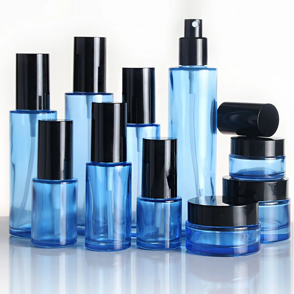 

Empty blue 80ml perfume bottle pump atomizer and cosmetic lotion glass bottle pump with black lid wholesale