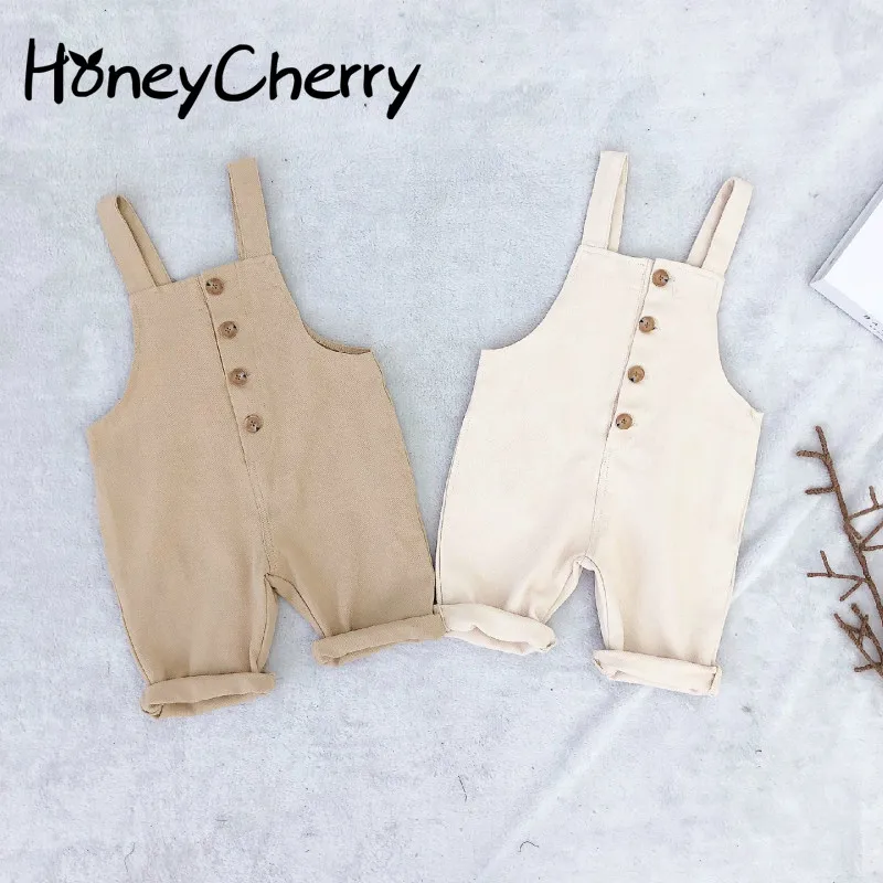 Online Ropa para niños Nueva versión coreana para chico de pantalones de correa para niños y niñas de Color puro de una sola fila hebilla de moda Niña mono
