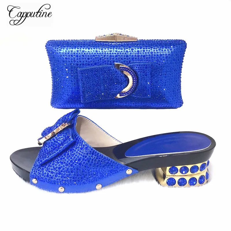 

Capputine Blue Color Decorated With Rhinestone Woman Shoes And Bag Set Italian Woman Shoes And Bag Set Large Size Size 38-43