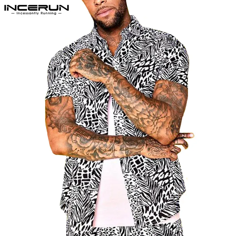 2019 مثير أزياء الرجال قمصان اللباس كم قصير التلبيب الياقة ليوبارد طباعة المحملة قمم الذكور Camisas قميص كبيرة 5XL الرجال الملابس 2019 مثير أزياء الرجال قمصان اللباس كم قصير التلبيب الياقة ليوبارد طباعة المحملة قمم الذكور Camisas قميص كبيرة 5XL الرجال الملابس