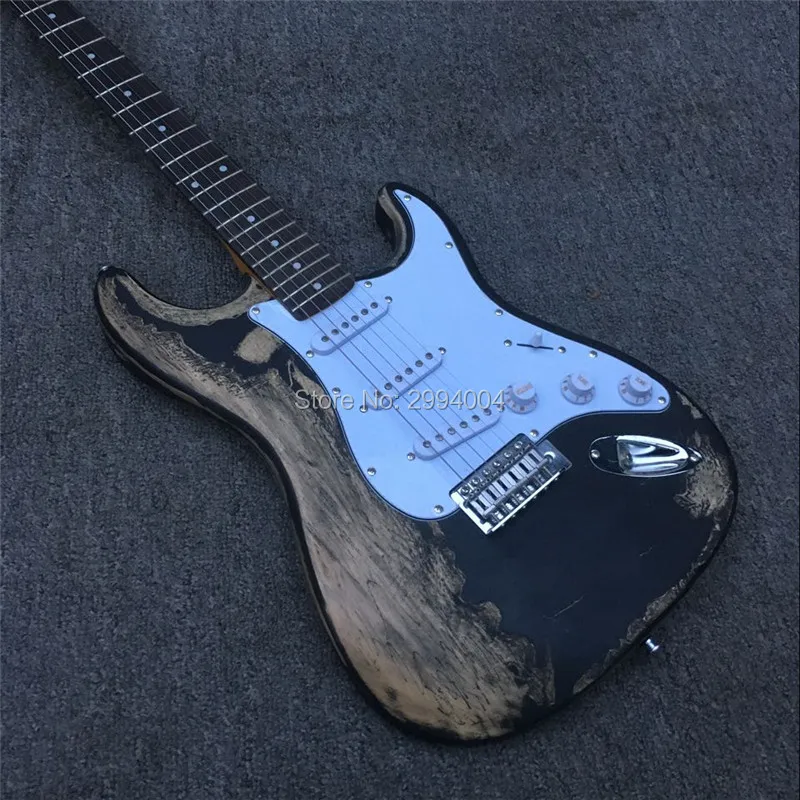 

In stock. Black ST antique relic The electric guitar, nitro paint made by hand. Real photos,
