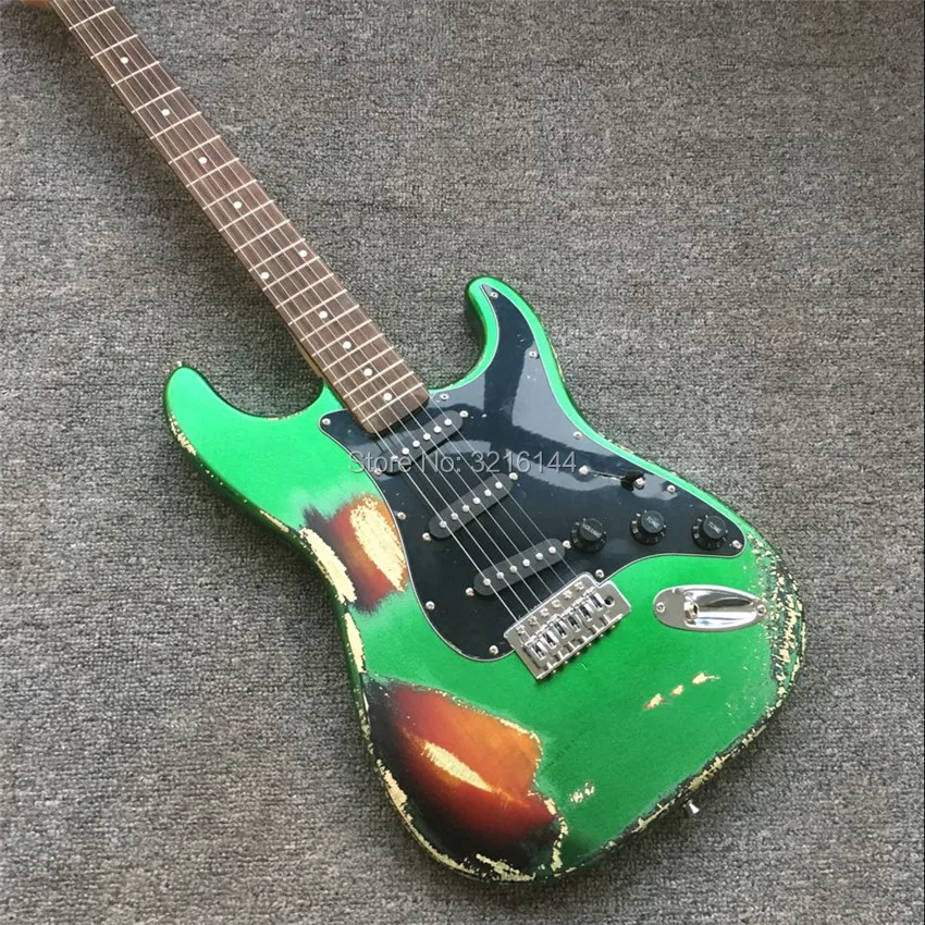 

In Stock , metallic green relic guitar restoring ancient ways, real photos, free shipping, black guard