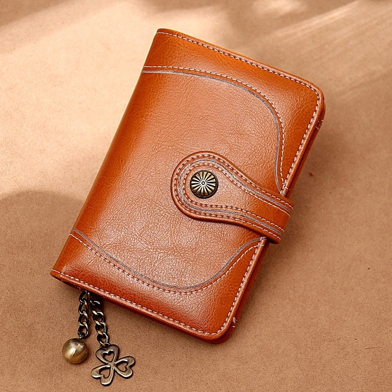 

Clutch Bag Spot Wallet Female Fashion Hollow Two Fold Ladies Short Wallet First Layer Cowhide Multi-Function Wallet Female
