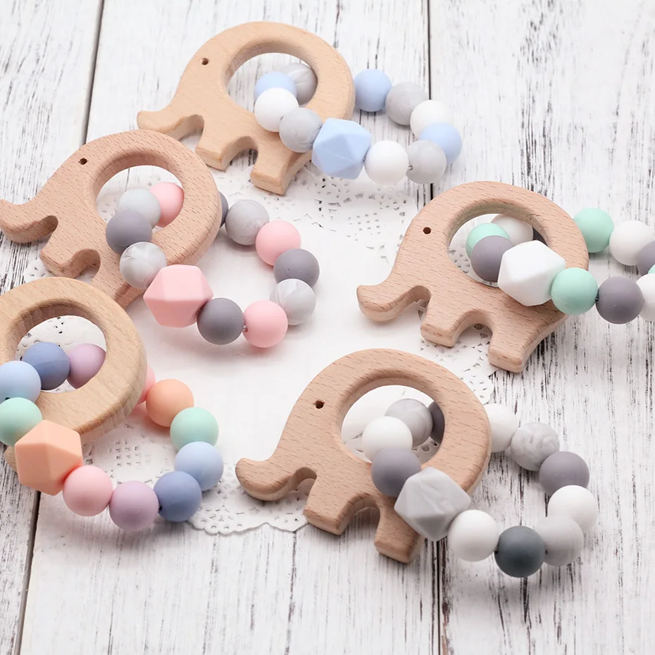 

NEW Wooden Baby Bracelet Animal Shaped Jewelry Teething Baby Organic Wood Silicone Beads Baby Rattle Stroller Accessories Toys
