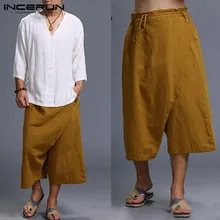 Харадзюку мужские брюки Твердые Большой неровный промежность шаровары длиной до середины икры шнурок широкие ноги мешковатые пляжные брюки для отдыха Pantalon